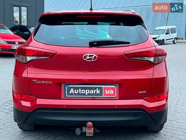 Червоний Хендай Туксон, об'ємом двигуна 2 л та пробігом 136 тис. км за 18690 $, фото 7 на Automoto.ua