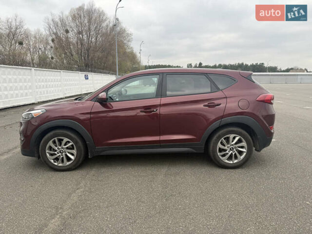 Червоний Хендай Туксон, об'ємом двигуна 2 л та пробігом 93 тис. км за 16500 $, фото 5 на Automoto.ua
