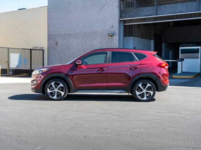 Червоний Хендай Туксон, об'ємом двигуна 1.6 л та пробігом 54 тис. км за 10300 $, фото 4 на Automoto.ua