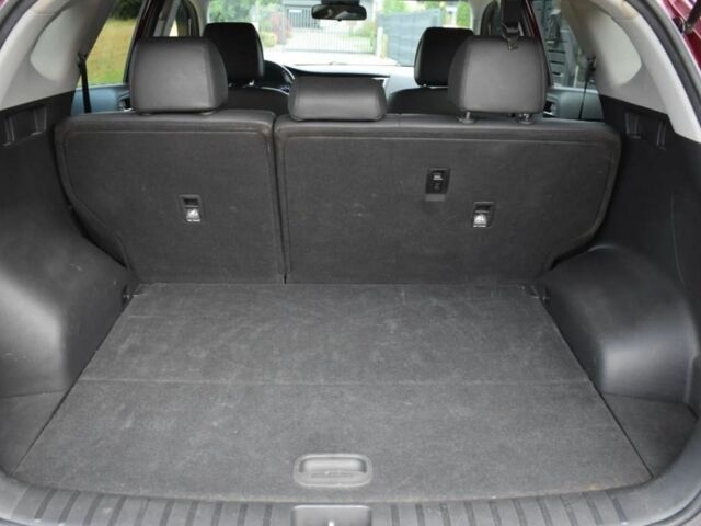 Красный Хендай Туксон, объемом двигателя 2 л и пробегом 34 тыс. км за 10000 $, фото 8 на Automoto.ua