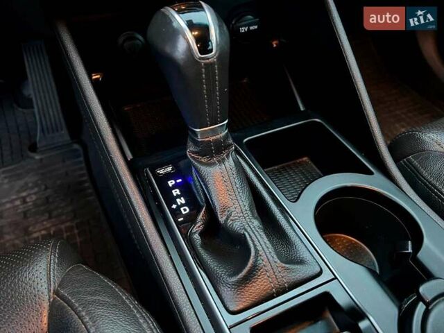 Червоний Хендай Туксон, об'ємом двигуна 2 л та пробігом 136 тис. км за 18690 $, фото 32 на Automoto.ua