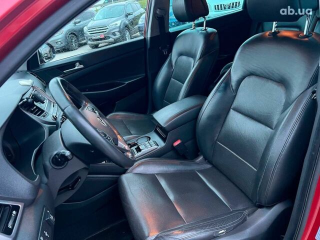 Червоний Хендай Туксон, об'ємом двигуна 2 л та пробігом 136 тис. км за 18690 $, фото 17 на Automoto.ua