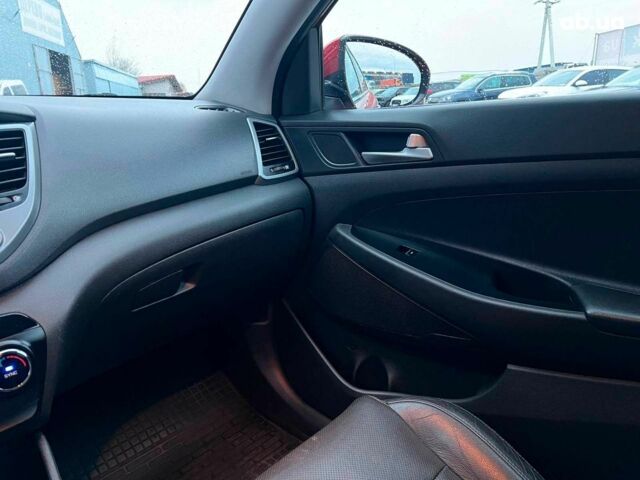 Червоний Хендай Туксон, об'ємом двигуна 2 л та пробігом 136 тис. км за 18690 $, фото 30 на Automoto.ua