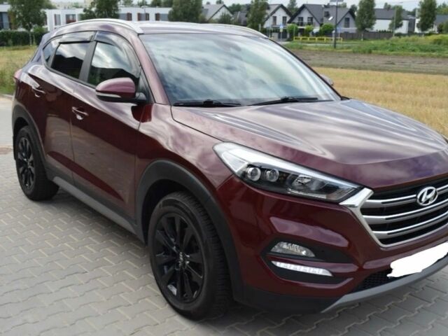 Червоний Хендай Туксон, об'ємом двигуна 2 л та пробігом 117 тис. км за 10300 $, фото 2 на Automoto.ua