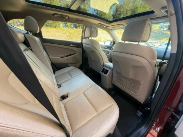 Червоний Хендай Туксон, об'ємом двигуна 1.6 л та пробігом 44 тис. км за 16000 $, фото 8 на Automoto.ua