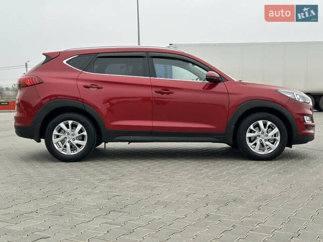 Красный Хендай Туксон, объемом двигателя 2 л и пробегом 91 тыс. км за 18800 $, фото 10 на Automoto.ua