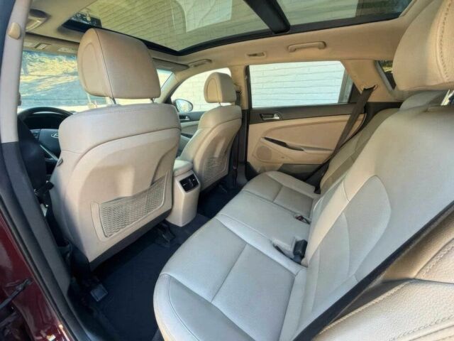 Красный Хендай Туксон, объемом двигателя 1.6 л и пробегом 39 тыс. км за 4800 $, фото 15 на Automoto.ua