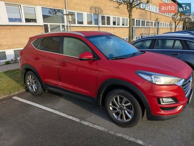 Красный Хендай Туксон, объемом двигателя 2 л и пробегом 157 тыс. км за 20000 $, фото 2 на Automoto.ua