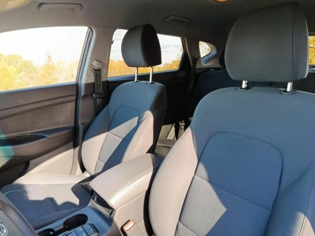 Червоний Хендай Туксон, об'ємом двигуна 2 л та пробігом 74 тис. км за 9600 $, фото 15 на Automoto.ua