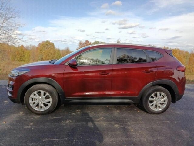 Червоний Хендай Туксон, об'ємом двигуна 2 л та пробігом 74 тис. км за 9600 $, фото 3 на Automoto.ua