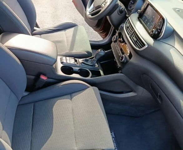 Красный Хендай Туксон, объемом двигателя 2 л и пробегом 130 тыс. км за 13000 $, фото 12 на Automoto.ua