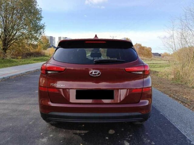 Красный Хендай Туксон, объемом двигателя 2 л и пробегом 131 тыс. км за 10450 $, фото 6 на Automoto.ua