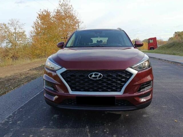 Красный Хендай Туксон, объемом двигателя 2 л и пробегом 131 тыс. км за 10450 $, фото 1 на Automoto.ua