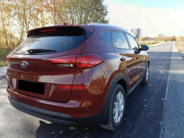 Червоний Хендай Туксон, об'ємом двигуна 2 л та пробігом 74 тис. км за 9600 $, фото 5 на Automoto.ua