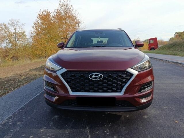 Красный Хендай Туксон, объемом двигателя 2 л и пробегом 130 тыс. км за 13000 $, фото 1 на Automoto.ua