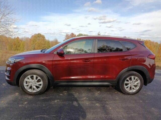 Красный Хендай Туксон, объемом двигателя 2 л и пробегом 130 тыс. км за 13000 $, фото 8 на Automoto.ua