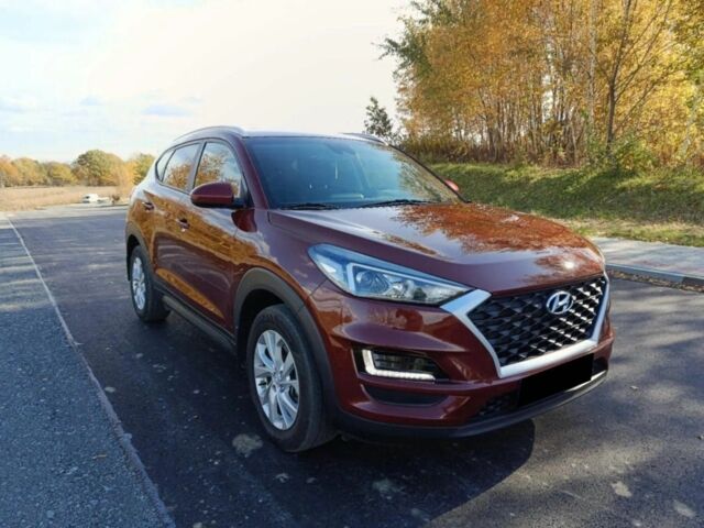 Червоний Хендай Туксон, об'ємом двигуна 2 л та пробігом 74 тис. км за 9600 $, фото 1 на Automoto.ua