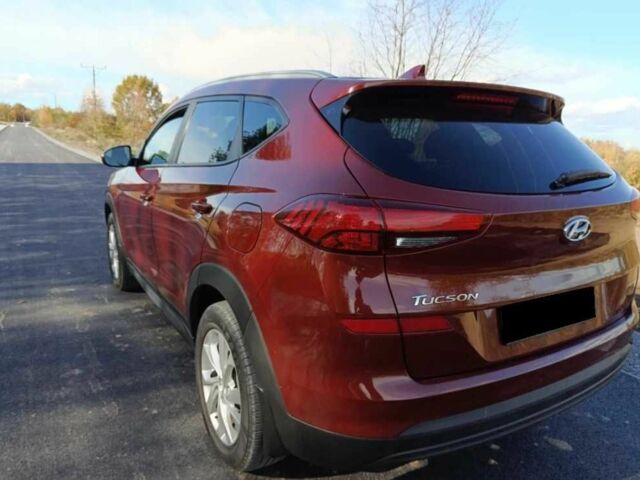 Красный Хендай Туксон, объемом двигателя 2 л и пробегом 131 тыс. км за 10450 $, фото 7 на Automoto.ua
