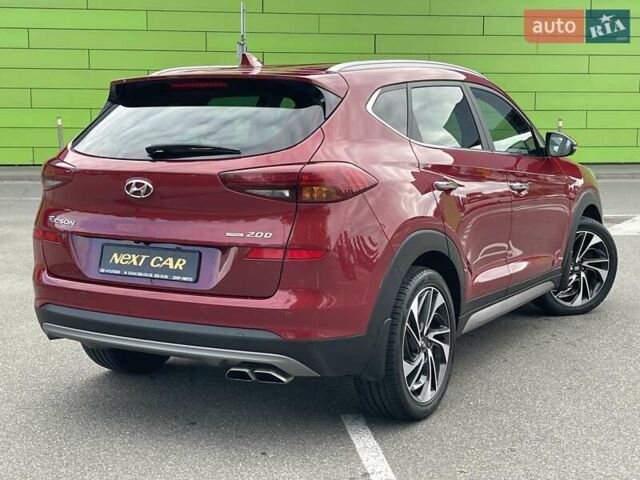 Красный Хендай Туксон, объемом двигателя 2 л и пробегом 64 тыс. км за 30500 $, фото 5 на Automoto.ua