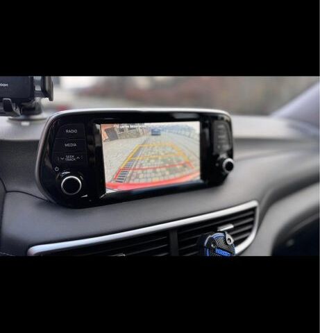 Красный Хендай Туксон, объемом двигателя 2 л и пробегом 70 тыс. км за 20000 $, фото 6 на Automoto.ua