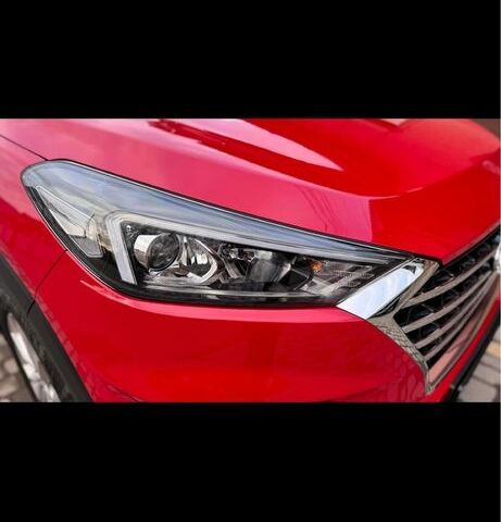 Красный Хендай Туксон, объемом двигателя 2 л и пробегом 70 тыс. км за 20000 $, фото 2 на Automoto.ua