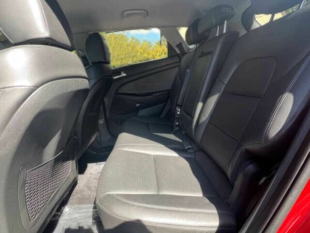 Червоний Хендай Туксон, об'ємом двигуна 2.4 л та пробігом 46 тис. км за 6400 $, фото 11 на Automoto.ua