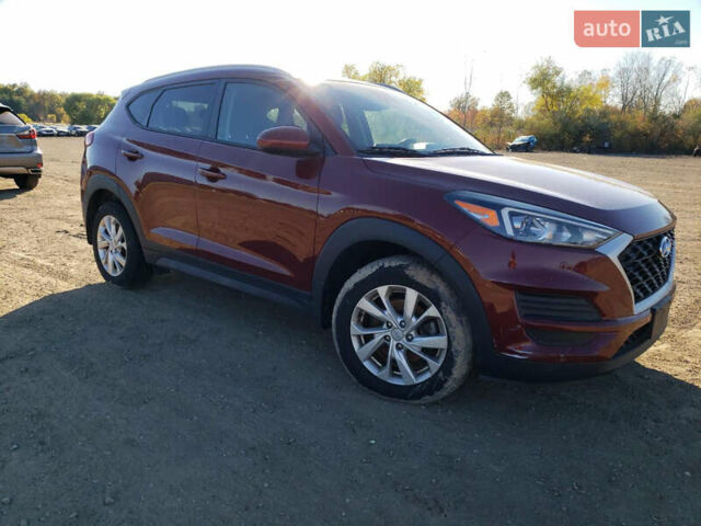 Красный Хендай Туксон, объемом двигателя 2 л и пробегом 71 тыс. км за 13300 $, фото 3 на Automoto.ua