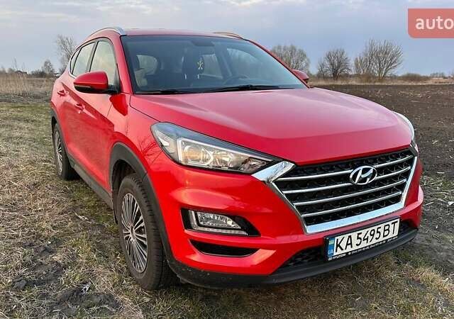 Красный Хендай Туксон, объемом двигателя 2 л и пробегом 68 тыс. км за 22000 $, фото 6 на Automoto.ua