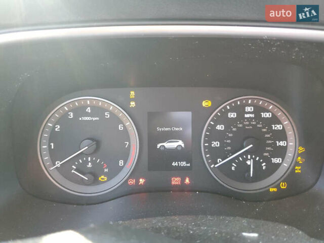 Красный Хендай Туксон, объемом двигателя 2 л и пробегом 71 тыс. км за 13300 $, фото 8 на Automoto.ua