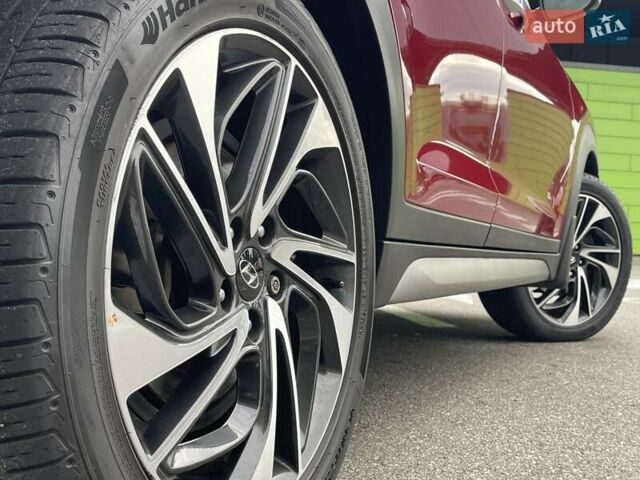 Красный Хендай Туксон, объемом двигателя 2 л и пробегом 64 тыс. км за 30500 $, фото 6 на Automoto.ua