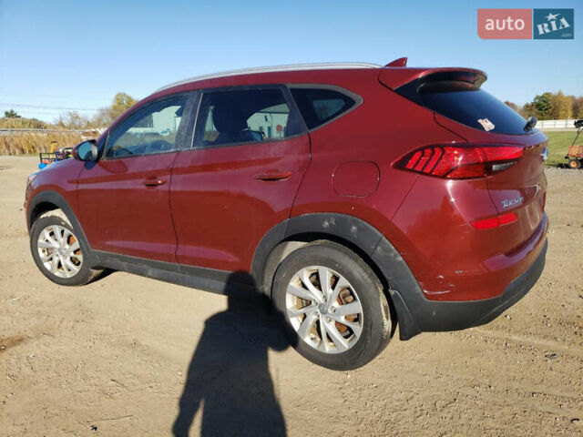 Красный Хендай Туксон, объемом двигателя 2 л и пробегом 71 тыс. км за 13300 $, фото 1 на Automoto.ua