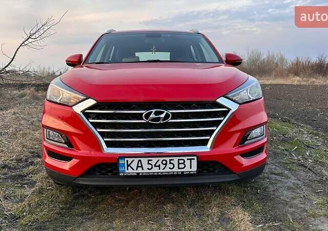 Красный Хендай Туксон, объемом двигателя 2 л и пробегом 68 тыс. км за 22000 $, фото 7 на Automoto.ua