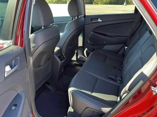 Красный Хендай Туксон, объемом двигателя 2.4 л и пробегом 38 тыс. км за 11300 $, фото 11 на Automoto.ua