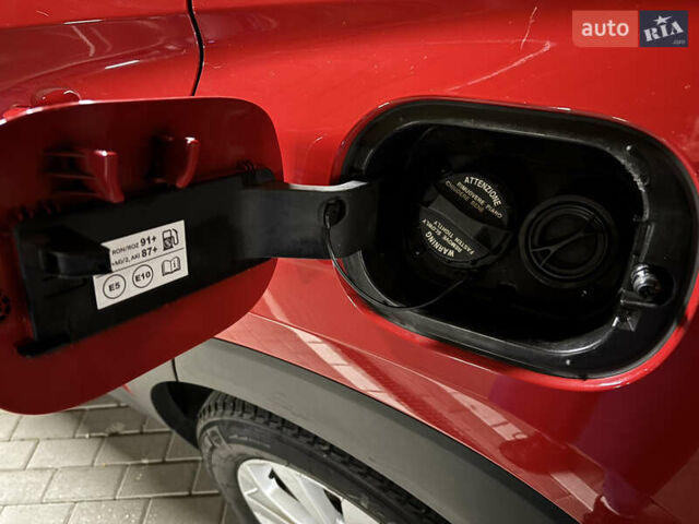 Красный Хендай Туксон, объемом двигателя 2 л и пробегом 95 тыс. км за 21500 $, фото 12 на Automoto.ua