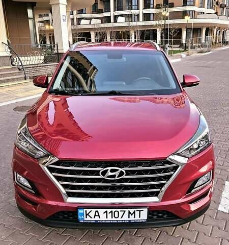 Красный Хендай Туксон, объемом двигателя 2 л и пробегом 94 тыс. км за 19500 $, фото 10 на Automoto.ua