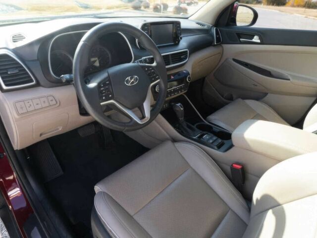 Красный Хендай Туксон, объемом двигателя 2 л и пробегом 45 тыс. км за 14000 $, фото 7 на Automoto.ua