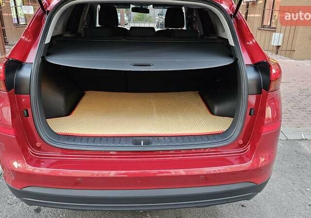 Красный Хендай Туксон, объемом двигателя 2 л и пробегом 94 тыс. км за 19500 $, фото 30 на Automoto.ua