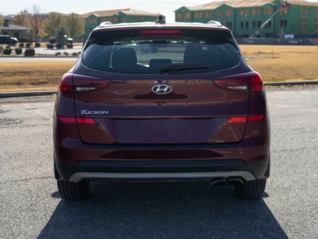 Красный Хендай Туксон, объемом двигателя 2 л и пробегом 45 тыс. км за 14000 $, фото 4 на Automoto.ua