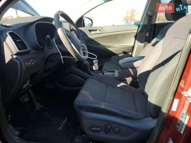 Красный Хендай Туксон, объемом двигателя 2 л и пробегом 71 тыс. км за 13300 $, фото 6 на Automoto.ua