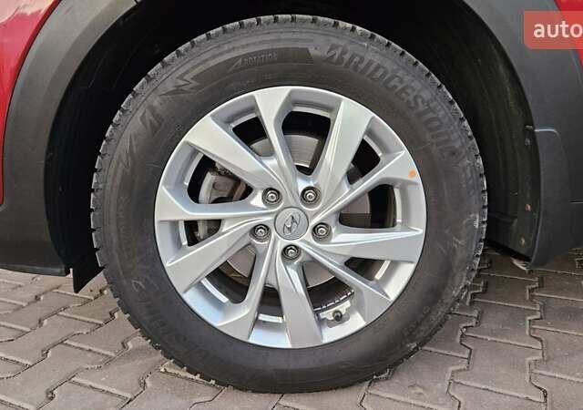 Красный Хендай Туксон, объемом двигателя 2 л и пробегом 94 тыс. км за 19500 $, фото 31 на Automoto.ua