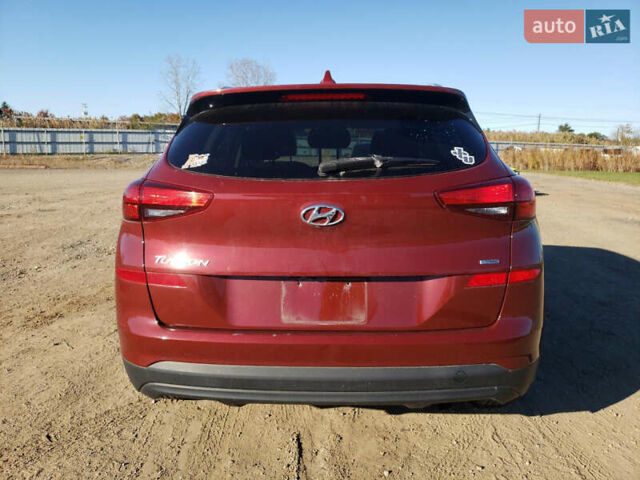 Красный Хендай Туксон, объемом двигателя 2 л и пробегом 71 тыс. км за 13300 $, фото 5 на Automoto.ua