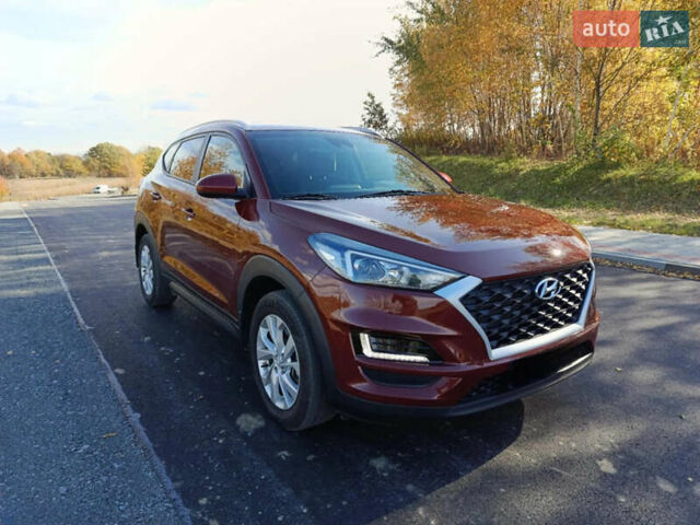 Красный Хендай Туксон, объемом двигателя 2 л и пробегом 97 тыс. км за 20000 $, фото 2 на Automoto.ua