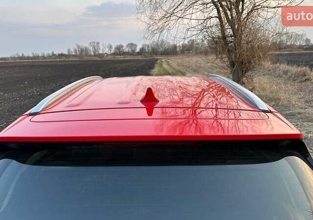 Красный Хендай Туксон, объемом двигателя 2 л и пробегом 68 тыс. км за 22000 $, фото 9 на Automoto.ua