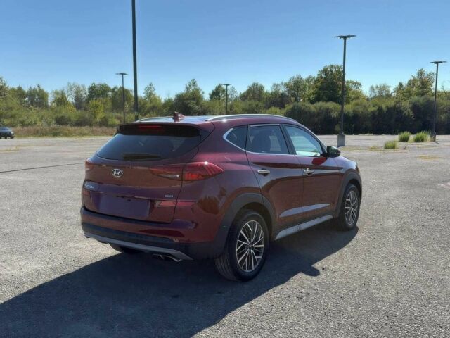 Червоний Хендай Туксон, об'ємом двигуна 2.4 л та пробігом 46 тис. км за 13500 $, фото 6 на Automoto.ua