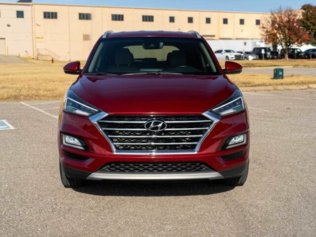 Красный Хендай Туксон, объемом двигателя 2 л и пробегом 45 тыс. км за 14000 $, фото 1 на Automoto.ua