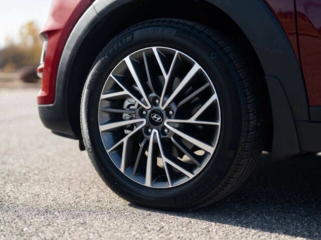 Красный Хендай Туксон, объемом двигателя 2 л и пробегом 45 тыс. км за 14000 $, фото 23 на Automoto.ua