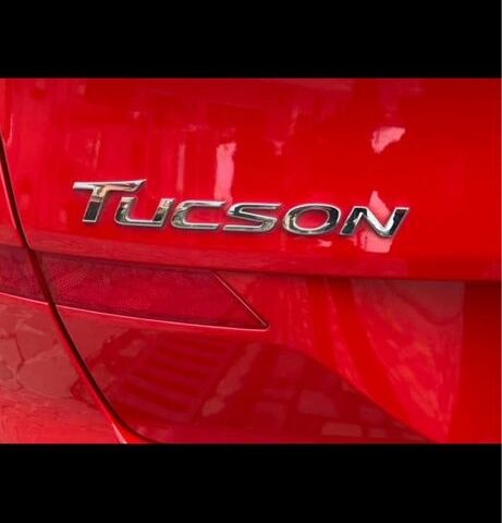 Красный Хендай Туксон, объемом двигателя 2 л и пробегом 70 тыс. км за 20000 $, фото 1 на Automoto.ua