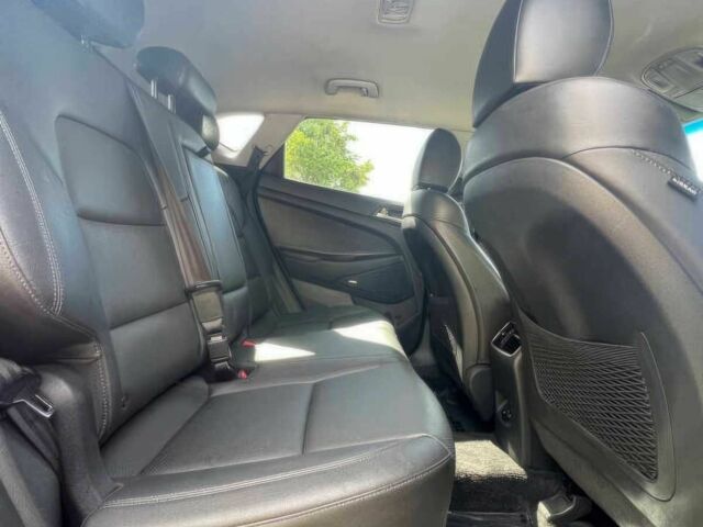 Червоний Хендай Туксон, об'ємом двигуна 2.4 л та пробігом 46 тис. км за 6400 $, фото 10 на Automoto.ua