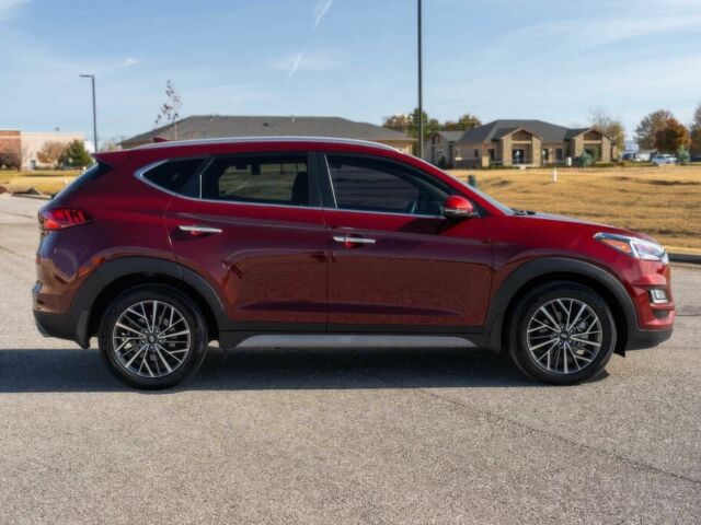 Красный Хендай Туксон, объемом двигателя 2 л и пробегом 45 тыс. км за 14000 $, фото 6 на Automoto.ua