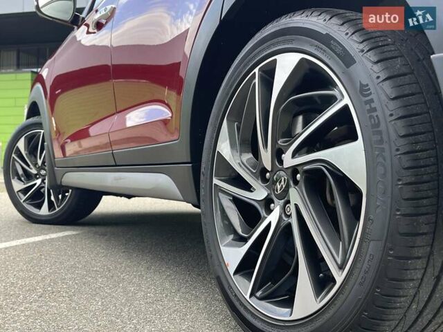 Красный Хендай Туксон, объемом двигателя 2 л и пробегом 64 тыс. км за 30500 $, фото 11 на Automoto.ua